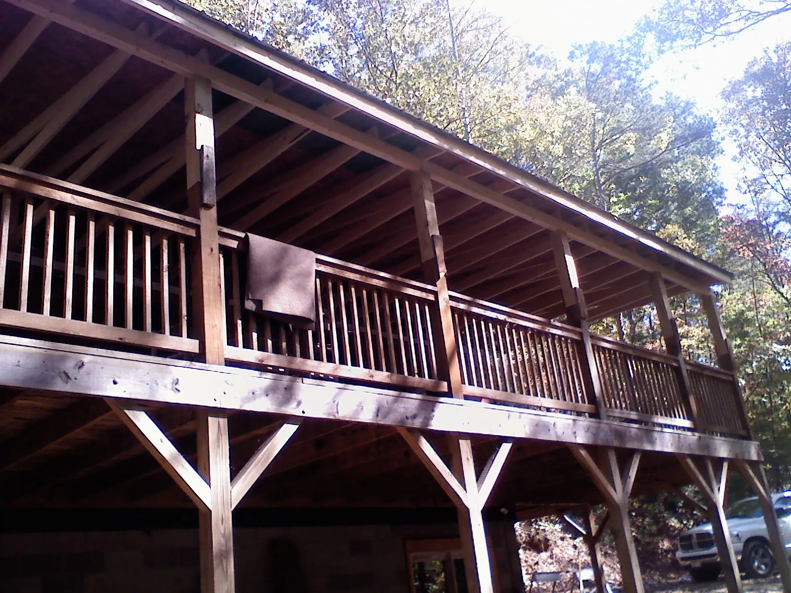 Timber framing under a new elevated porch and deck — Roof Leak Repair in Belton by Roofing Brothers